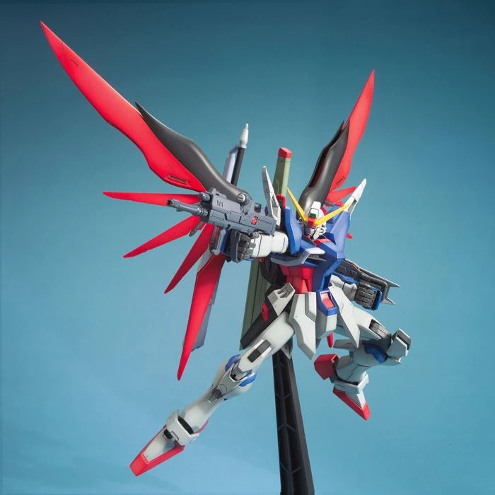 MG Destiny Gundam model kit action pose with beam rifle