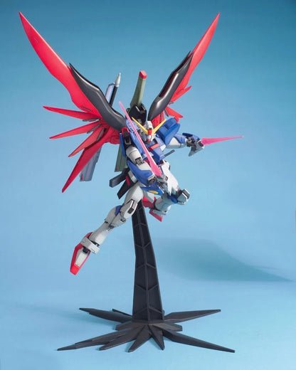 MG Destiny Gundam model kit action pose with beam boomerang